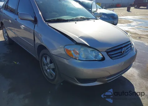 2003 Toyota Corolla Le z USA, uszkodzony, nr VIN 1NXBR32E03Z138400